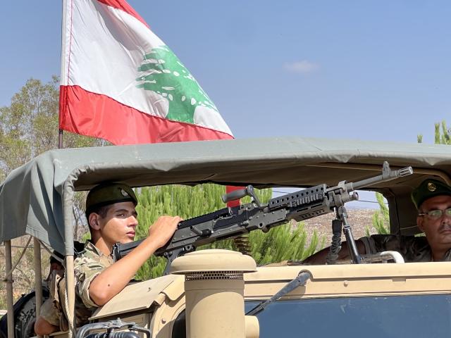 (260721) -- ZAWTAR AL-GHARBIYA, July 21, 2026 (Xinhua) -- A soldier of Lebanese army guards at the town of Zawtar al-Gharbiya in southern Lebanon on July 21, 2026. Units of the Lebanese army on Tuesday began deploying in the town of Zawtar al-Gharbiya in southern Lebanon following the withdrawal of Israeli forces from the area, a Lebanese security source and eyewitnesses told Xinhua. (Photo by Ali Hashisho/Xinhua)