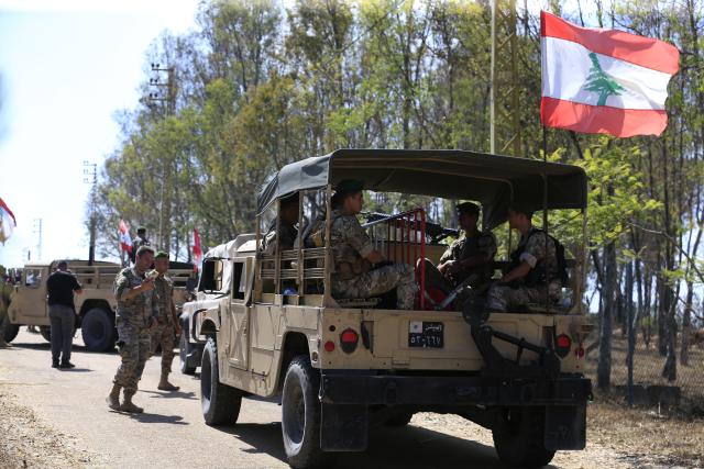 (260721) -- ZAWTAR AL-GHARBIYA, July 21, 2026 (Xinhua) -- Soldiers of Lebanese army guard at the town of Zawtar al-Gharbiya in southern Lebanon on July 21, 2026. Units of the Lebanese army on Tuesday began deploying in the town of Zawtar al-Gharbiya in southern Lebanon following the withdrawal of Israeli forces from the area, a Lebanese security source and eyewitnesses told Xinhua. (Photo by Ali Hashisho/Xinhua)