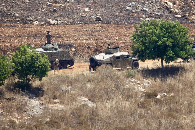 (260721) -- ZAWTAR AL-GHARBIYA, July 21, 2026 (Xinhua) -- Soldiers of Lebanese army guard at the town of Zawtar al-Gharbiya in southern Lebanon on July 21, 2026. Units of the Lebanese army on Tuesday began deploying in the town of Zawtar al-Gharbiya in southern Lebanon following the withdrawal of Israeli forces from the area, a Lebanese security source and eyewitnesses told Xinhua. (Photo by Ali Hashisho/Xinhua)