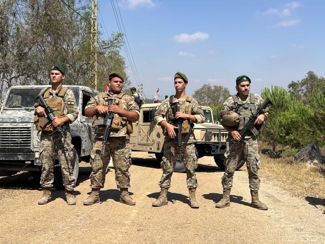 (260721) -- ZAWTAR AL-GHARBIYA, July 21, 2026 (Xinhua) -- Soldiers of Lebanese army guard at the town of Zawtar al-Gharbiya in southern Lebanon on July 21, 2026. Units of the Lebanese army on Tuesday began deploying in the town of Zawtar al-Gharbiya in southern Lebanon following the withdrawal of Israeli forces from the area, a Lebanese security source and eyewitnesses told Xinhua. (Photo by Ali Hashisho/Xinhua)