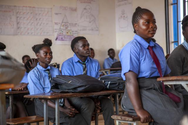 (260721) -- LUSAKA, July 21, 2026 (Xinhua) -- Students attend class at Minsenga Secondary School built by Sino-Metals Leach Zambia Limited in Kalulushi, Copperbelt Province, Zambia, on July 14, 2026. TO GO WITH "Feature: Chinese companies expand access to education for rural children in Zambia" (Photo by Martin Mbangweta/Xinhua)