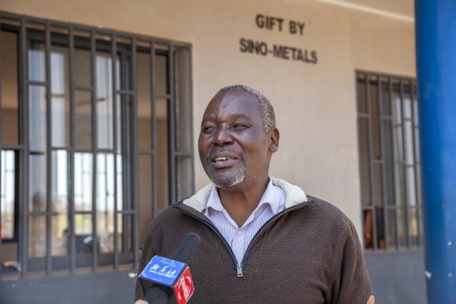 (260721) -- LUSAKA, July 21, 2026 (Xinhua) -- Andrew Mfune, headmaster of Minsenga Secondary School, speaks to Xinhua in Kalulushi, Copperbelt Province, Zambia, on July 14, 2026. TO GO WITH "Feature: Chinese companies expand access to education for rural children in Zambia" (Photo by Martin Mbangweta/Xinhua)