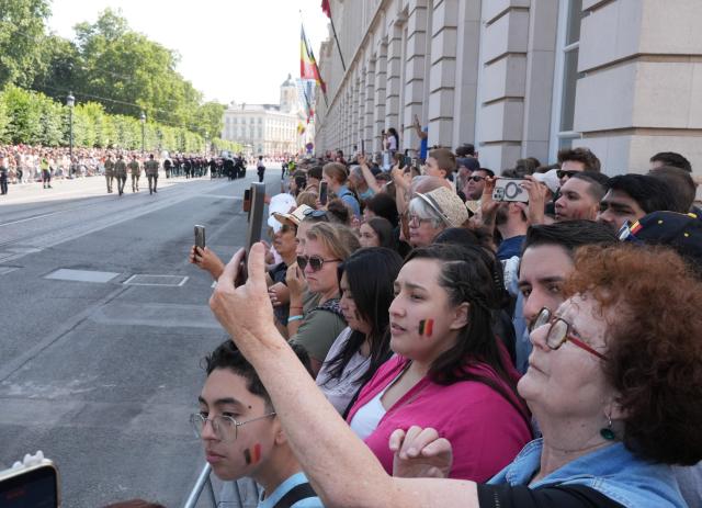 (260721) -- BRUSSELS, July 21, 2026 (Xinhua) -- People watch a military and civil parade of Belgian National Day celebrations in Brussels, Belgium, on July 21, 2026. (Xinhua/Weng Xinyang)