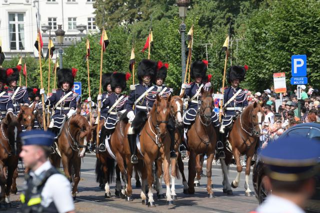 (260721) -- BRUSSELS, July 21, 2026 (Xinhua) -- Cavalrymen march during a military and civil parade of Belgian National Day celebrations in Brussels, Belgium, on July 21, 2026. (Xinhua/Weng Xinyang)