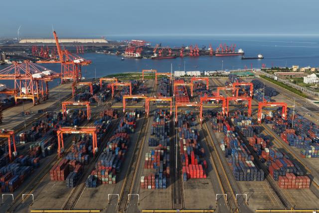 (260722) -- TANGSHAN, July 22, 2026 (Xinhua) -- An aerial drone photo taken on July 21, 2026 shows a container yard at the Jingtang area of Tangshan Port in Tangshan, north China's Hebei Province. Cargo throughput of Tangshan Port reached 445.56 million tonnes in the first half of 2026, up 2.77 percent year on year, according to local port administration. (Xinhua/Yang Shiyao)