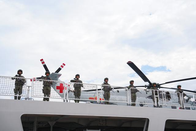 (260722) -- QINGDAO, July 22, 2026 (Xinhua) -- Soldiers stand in formation aboard the Chinese People's Liberation Army (PLA) Navy hospital ship, Auspicious Ark, at a port in Qingdao, east China's Shandong Province, on July 22, 2026. The Chinese navy hospital ship departed from a port in Qingdao on Wednesday for a humanitarian medical service mission in Africa and South Asia. (Photo by Liu Zaiyao/Xinhua)