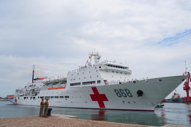 (260722) -- QINGDAO, July 22, 2026 (Xinhua) -- The Chinese People's Liberation Army (PLA) Navy hospital ship, Auspicious Ark, departs from a port in Qingdao, east China's Shandong Province, on July 22, 2026. The Chinese navy hospital ship departed from a port in Qingdao on Wednesday for a humanitarian medical service mission in Africa and South Asia. (Photo by Liu Zaiyao/Xinhua)