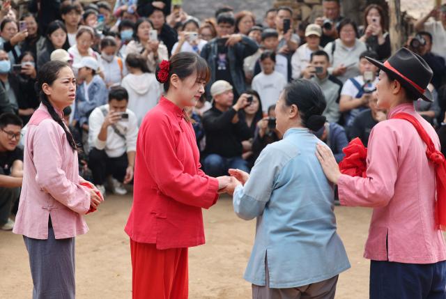 (260722) -- LINYI, July 22, 2026 (Xinhua) -- This file photo taken in October 2024 shows villagers performing a short play in Yinan County, Linyi City, east China's Shandong Province. TO GO WITH "China Focus: Chinese villagers take center stage in revitalizing rural culture" (Xinhua)