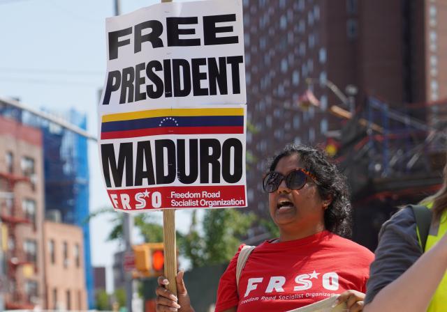 (260722) -- NEW YORK, July 22, 2026 (Xinhua) -- Supporters of Venezuelan President Nicolas Maduro protest outside a courthouse in New York, the United States, July 22, 2026. Venezuelan President Nicolas Maduro and his wife Cilia Flores will go on trial starting on June 1, 2027, a U.S. judge ruled on Wednesday.
The couple, who pleaded not guilty to drug trafficking and firearms charges, made their third appearance in a New York court after the forcible seizure by U.S. troops in a military raid in early January. (Xinhua/Zhang Fengguo)