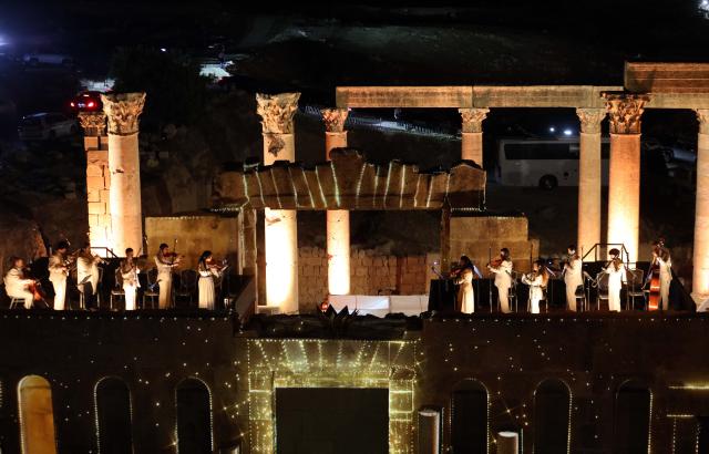 (260722) -- JERASH, July 22, 2026 (Xinhua) -- Artists perform at a theater of Jerash archaeological site during the 40th Jerash Festival for Culture and Arts in Jerash, Jordan, July 22, 2026. Jordan's Jerash Festival for Culture and Arts will mark its 40th edition from July 22 to Aug. 2, turning the ancient Roman city of Jerash into a vibrant hub for cultural exchange, artistic expression and civilizational dialogue. (Photo by Mohammad Abu Ghosh/Xinhua)