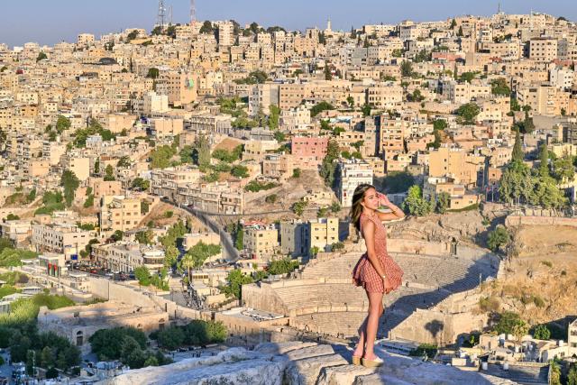 (260723) -- BEIJING, July 23, 2026 (Xinhua) -- A tourist poses for a photo at the Citadel in Amman, Jordan, on July 20, 2026. (Xinhua/Xin Mengchen)