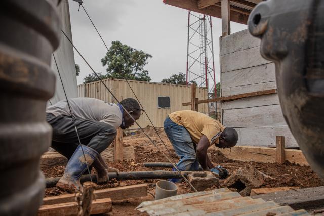(260723) -- KINSHASA, July 23, 2026 (Xinhua) -- Workers build an Ebola treatment center in Beni territory of North Kivu Province, the Democratic Republic of the Congo (DRC), on July 22, 2026. Over two months, the fastest-in-the-world Ebola outbreak in the Democratic Republic of the Congo (DRC) has left more than 1,000 dead. (Xinhua)