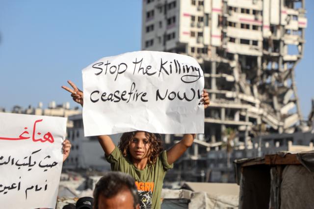 (260723) -- GAZA, July 23, 2026 (Xinhua) -- Palestinians take part in a march to protest against Israeli plans for forced displacement in Gaza City, July 23, 2026. (Photo by Rizek Abdeljawad/Xinhua)