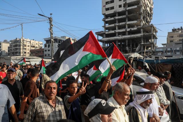 (260723) -- GAZA, July 23, 2026 (Xinhua) -- Palestinians take part in a march to protest against Israeli plans for forced displacement in Gaza City, July 23, 2026. (Photo by Rizek Abdeljawad/Xinhua)