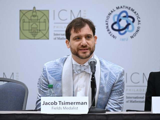 (260723) -- PHILADELPHIA, July 23, 2026 (Xinhua) -- Canada's mathematician Jacob Tsimerman attends a press conference after the opening ceremony of the 2026 International Congress of Mathematicians in Philadelphia, the United States, July 23, 2026. Chinese mathematicians Deng Yu and Wang Hong were awarded the Fields Medals at the opening ceremony of the 2026 International Congress of Mathematicians held here on Thursday, marking the first time Chinese mathematicians have won the prestigious honor. The other recipients of the 2026 Fields Medals are American John Pardon and Canada's Jacob Tsimerman. (Xinhua/Li Rui)