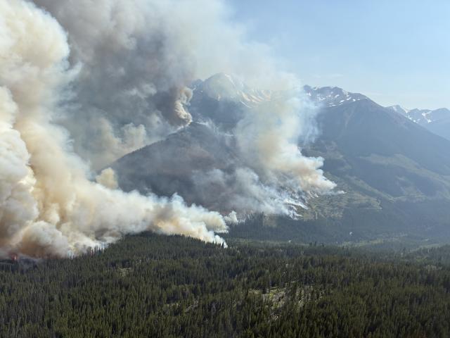 (260724) -- OTTAWA, July 24, 2026 (Xinhua) -- An aerial photo provided by the BC Wildfire Service on July 22, 2026 shows a wildfire near Bonanza Creek in British Columbia, Canada. (BC Wildfire Service/Handout via Xinhua)