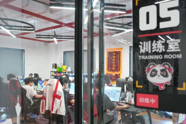 (260724) -- CHENGDU, July 24, 2026 (Xinhua) -- Esports players participate in a training session in Tianfu Long Island Digital Cultural and Creative Park in Chengdu, southwest China's Sichuan Province, on July 22, 2026. The animated film "All Wishes Come True" released nationwide recently has won praise for its fresh take on Chinese mythology and stunning visual effects. Following the resounding success of animation film series of "Ne Zha," it is another blockbuster developed at Tianfu Long Island Digital Cultural and Creative Park under the Chengdu High-Tech Industrial Development Zone. 
   The park is home to more than 70 digital cultural and creative enterprises covering sectors such as animation, game development and esports. The Chengdu High-Tech Industrial Development Zone, for its part, now hosts more than 6,000 companies in the digital cultural and creative industry, reflecting the city's rapidly growing creative economy. (Xinhua/Xu Bingjie)