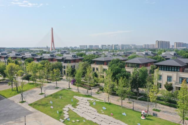 (260724) -- CHENGDU, July 24, 2026 (Xinhua) -- A drone photo taken on July 23, 2026 shows a view of Tianfu Long Island Digital Cultural and Creative Park in Chengdu, southwest China's Sichuan Province. The animated film "All Wishes Come True" released nationwide recently has won praise for its fresh take on Chinese mythology and stunning visual effects. Following the resounding success of animation film series of "Ne Zha," it is another blockbuster developed at Tianfu Long Island Digital Cultural and Creative Park under the Chengdu High-Tech Industrial Development Zone. 
   The park is home to more than 70 digital cultural and creative enterprises covering sectors such as animation, game development and esports. The Chengdu High-Tech Industrial Development Zone, for its part, now hosts more than 6,000 companies in the digital cultural and creative industry, reflecting the city's rapidly growing creative economy. (Xinhua/Xu Bingjie)