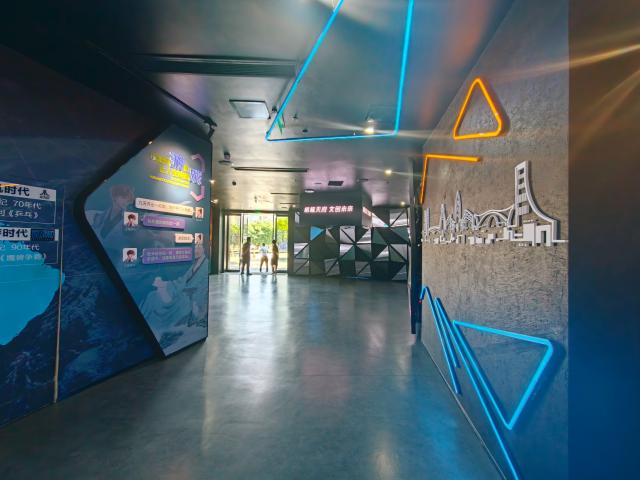 (260724) -- CHENGDU, July 24, 2026 (Xinhua) -- This photo taken on July 22, 2026 shows an exhibition hall in Tianfu Long Island Digital Cultural and Creative Park in Chengdu, southwest China's Sichuan Province. The animated film "All Wishes Come True" released nationwide recently has won praise for its fresh take on Chinese mythology and stunning visual effects. Following the resounding success of animation film series of "Ne Zha," it is another blockbuster developed at Tianfu Long Island Digital Cultural and Creative Park under the Chengdu High-Tech Industrial Development Zone. 
   The park is home to more than 70 digital cultural and creative enterprises covering sectors such as animation, game development and esports. The Chengdu High-Tech Industrial Development Zone, for its part, now hosts more than 6,000 companies in the digital cultural and creative industry, reflecting the city's rapidly growing creative economy. (Xinhua/Bao Feifei)