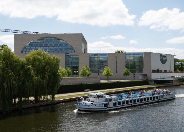 (260724) -- BERLIN, July 24, 2026 (Xinhua) -- A sight-seeing ship sails past the German Chancellery in Berlin, Germany, July 24, 2026. German Chancellor Friedrich Merz on Friday announced a major reshuffle of his cabinet, highlighted by the appointment of Nina Warken as the new Chancellery head and Carsten Linnemann as the health minister. (Xinhua/Zhang Haofu)