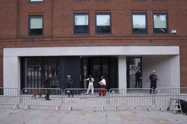 (260724) -- MANCHESTER, July 24, 2026 (Xinhua) -- Police officers are on duty outside the Heron House where No10 North is located in Manchester, Britain, on July 24, 2026. British Prime Minister Andy Burnham on Thursday began working from a new government office in Manchester, dubbed "No10 North," as part of his plan to shift economic decision-making away from Westminster and devolve more powers to local authorities.
   Located at Heron House in central Manchester, the office will serve as the government's new "situation room for growth," coordinating work on local economic development and devolution, according to a government statement. (Photo by Jon Super/Xinhua)