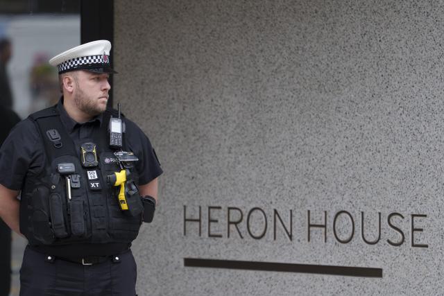 (260724) -- MANCHESTER, July 24, 2026 (Xinhua) -- A police officer stands outside the Heron House where No10 North is located in Manchester, Britain, on July 24, 2026. British Prime Minister Andy Burnham on Thursday began working from a new government office in Manchester, dubbed "No10 North," as part of his plan to shift economic decision-making away from Westminster and devolve more powers to local authorities.
   Located at Heron House in central Manchester, the office will serve as the government's new "situation room for growth," coordinating work on local economic development and devolution, according to a government statement. (Photo by Jon Super/Xinhua)