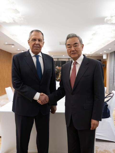 (260724) -- CHOLPON-ATA, July 24, 2026 (Xinhua) -- Chinese Foreign Minister Wang Yi, also a member of the Political Bureau of the Communist Party of China Central Committee, meets with Russian Foreign Minister Sergey Lavrov on the sidelines of the Meeting of the Council of the Ministers of Foreign Affairs of the Shanghai Cooperation Organization (SCO) Member States in Kyrgyzstan, July 24, 2026. (Xinhua/Li Renzi)