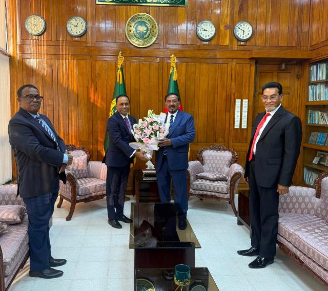 (260724) -- DHAKA, July 24, 2026 (Xinhua) -- Bangladesh Parliament Speaker Hafiz Uddin Ahmad (2nd R) receives congratulations after assuming presidential duties at the Bangladesh Parliament building in Dhaka, Bangladesh, July 24, 2026. The Bangladesh National Parliament Secretariat confirmed to the media on Friday that Parliament Speaker Hafiz Uddin Ahmad has begun discharging the functions of the president in accordance with the Constitution following the resignation of Mohammed Shahabuddin Chuppu. (Xinhua)
