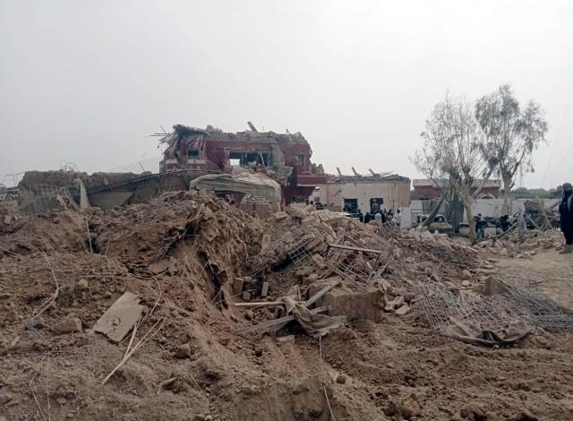 (260724) -- TANK, July 24, 2026 (Xinhua) -- This photo taken with mobile phone shows destroyed security post in Tank district in Pakistan's northwest Khyber Pakhtunkhwa province on July 24, 2026. At least 14 people, including security personnel, police officers and a forest department official, were killed in a suicide bombing targeting a security post in Pakistan's northwest Khyber Pakhtunkhwa province, security sources said on Friday. (Str/Xinhua)