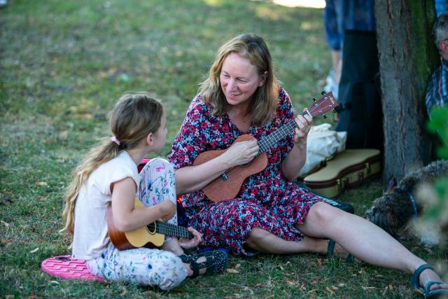 (260725) -- PRAGUE, July 25, 2026 (Xinhua) -- People play the ukuleles at the 14th Czech Ukulele Festival in Prague, the Czech Republic, July 24, 2026. The 14th Czech Ukulele Festival, running from July 24 to 26, features public performances, concerts and music workshops. (Photo by Dana Kesnerova/Xinhua)