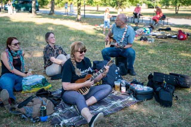 (260725) -- PRAGUE, July 25, 2026 (Xinhua) -- People play the ukuleles at the 14th Czech Ukulele Festival in Prague, the Czech Republic, July 24, 2026. The 14th Czech Ukulele Festival, running from July 24 to 26, features public performances, concerts and music workshops. (Photo by Dana Kesnerova/Xinhua)