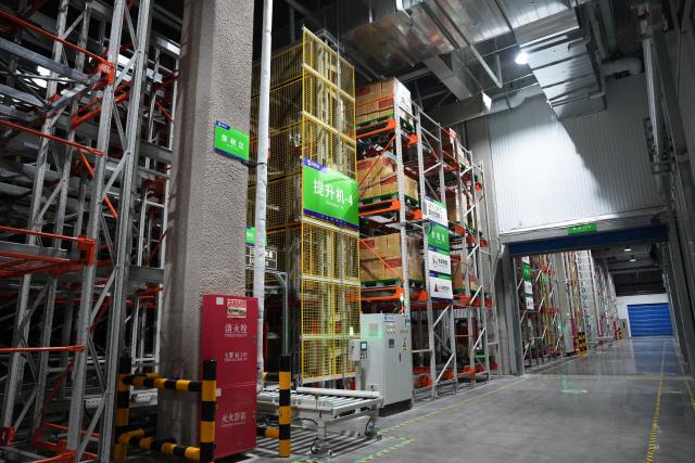 (260725) -- BEIJING, July 25, 2026 (Xinhua) -- This photo taken on July 10, 2026 shows a warehouse of Concare, a company specializing in cold-chain logistics for life sciences at Beijing Daxing Airport City in Beijing, capital of China. TO GO WITH "Feature: Aerotropolis economy gains altitude at Beijing's youngest airport" (Xinhua/Dai Mingxuan)