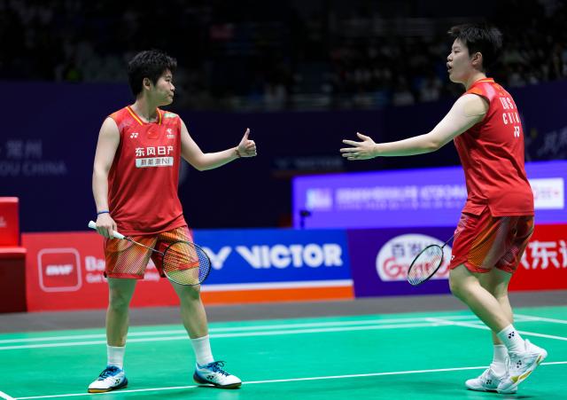 (260725) -- CHANGZHOU, July 25, 2026 (Xinhua) -- Liu Shengshu/Tan Ning (L) celebrate a point during the women's doubles semifinal match between Liu Shengshu/Tan Ning of China and Baek Ha Na/Lee So Hee of South Korea at the 2026 China Open badminton tournament in Changzhou, east China's Jiangsu Province, July 25, 2026. (Xinhua/Sun Fei)