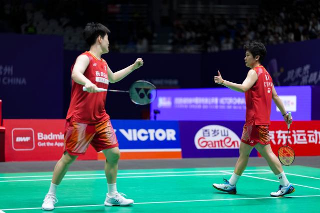 (260725) -- CHANGZHOU, July 25, 2026 (Xinhua) -- Liu Shengshu/Tan Ning (R) celebrate a point during the women's doubles semifinal match between Liu Shengshu/Tan Ning of China and Baek Ha Na/Lee So Hee of South Korea at the 2026 China Open badminton tournament in Changzhou, east China's Jiangsu Province, July 25, 2026. (Xinhua/Sun Fei)