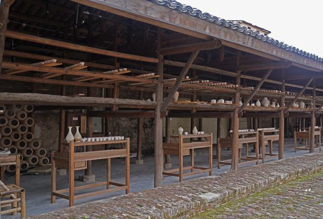 (260725) -- JINGDEZHEN, July 25, 2026 (Xinhua) -- This photo taken on July 9, 2026 shows a view of a porcelain workshop complex in Jingdezhen, east China's Jiangxi Province. The United Nations Educational, Scientific and Cultural Organization (UNESCO) added China's Jingdezhen Handicraft Porcelain Industry Sites to the World Heritage List on Saturday during the 48th session of the World Heritage Committee held in Busan, South Korea.
   The inscription brings the total number of World Heritage sites in China to 61. (Xinhua/Wan Xiang)