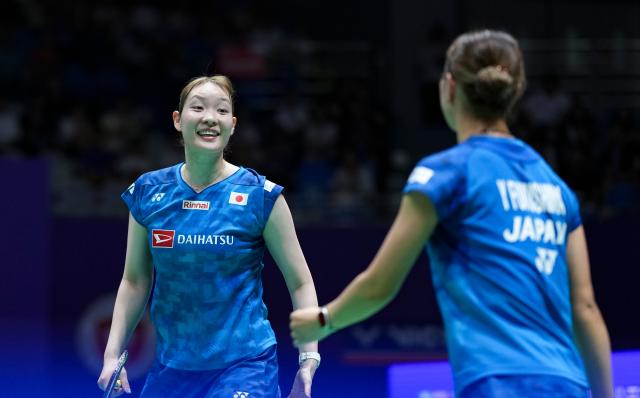 (260725) -- CHANGZHOU, July 25, 2026 (Xinhua) -- Fukushima Yuki/Matsumoto Mayu (L) celebrate a score during the women's doubles semifinal match between Li Yijing/Luo Xumin of China and Fukushima Yuki/Matsumoto Mayu of Japan at the China Open 2026 badminton tournament in Changzhou, east China's Jiangsu Province, July 25, 2026. (Xinhua/Sun Fei)