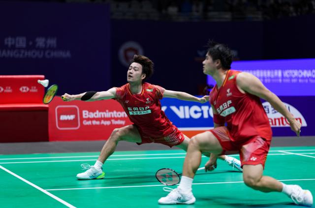 (260725) -- CHANGZHOU, July 25, 2026 (Xinhua) -- Liang Weikeng/Wang Chang (L) compete during the men's doubles semifinal match between Liang Weikeng/Wang Chang of China and Fajar Alfian/Muhammad Shohibul Fikri of Indonesia at the China Open 2026 badminton tournament in Changzhou, east China's Jiangsu Province, July 25, 2026. (Xinhua/Sun Fei)