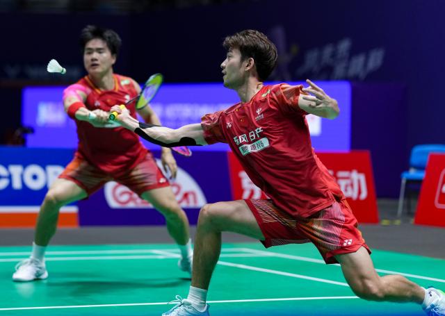 (260725) -- CHANGZHOU, July 25, 2026 (Xinhua) -- Liang Weikeng/Wang Chang (R) compete during the men's doubles semifinal match between Liang Weikeng/Wang Chang of China and Fajar Alfian/Muhammad Shohibul Fikri of Indonesia at the China Open 2026 badminton tournament in Changzhou, east China's Jiangsu Province, July 25, 2026. (Xinhua/Sun Fei)