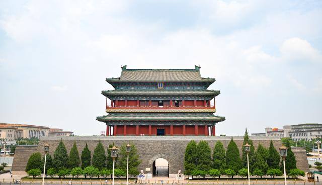 (260725) -- BEIJING, July 25, 2026 (Xinhua) -- This photo taken on July 24, 2026 shows a view of the Zhengyangmen Gate in Beijing, capital of China. Beijing has launched environmental renovation for Zhengyangmen Gate, Zhengyangmen Archery Tower and surrounding areas in 2026. Marking the second anniversary of the successful inscription of the Beijing Central Axis on the UNESCO World Heritage List, heritage sites along the Beijing Central Axis, such as the Palace Museum, Zhengyangmen Gate, and Altar of the God of Agriculture, also referred to as the Xiannongtan Temple, will either open to the public free of charge or launch new exhibitions on July 27.
  Over the past two years, efforts to conserve, inherit and make good use of the Beijing Central Axis have advanced steadily, achieving new outcomes in areas including related legal system, UNESCO World Heritage signage, landscape improvement, creative utilization, collaborative protection and international communication. (Xinhua/Chen Zhonghao)