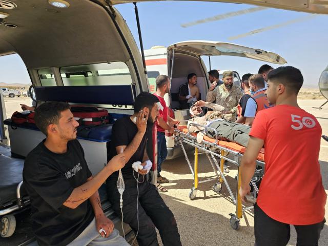 (260725) -- HOMS, July 25, 2026 (Xinhua) -- Injured passengers are seen following a collision involving two passenger buses on the Damascus-Deir al-Zour highway in Homs province, Syria, July 25, 2026. The death toll from a collision involving two passenger buses on the Damascus-Deir al-Zour highway in central Syria on Saturday has risen to 35, Syrian state news agency SANA reported, citing a health official. (Str/Xinhua)