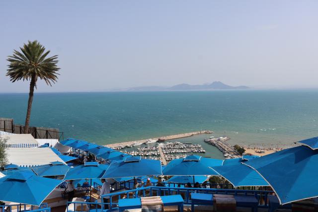 (260725) -- TUNIS, July 25, 2026 (Xinhua) -- This photo taken on July 25, 2026, shows a view of the Gulf of Tunis seen from the blue and white village of Sidi Bou Said, north of Tunisia. Tunisia's iconic village of Sidi Bou Said has been inscribed on the UNESCO World Heritage List, the country's Ministry of Cultural Affairs said on Saturday. (Xinhua/Zhou Haojin)