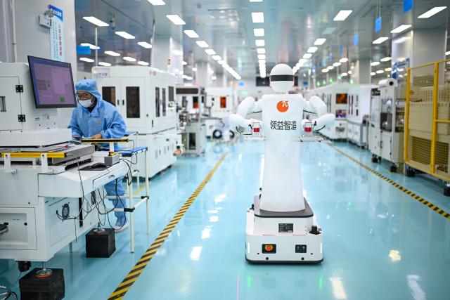 (260726) -- YANCHENG, July 26, 2026 (Xinhua) -- A robot works at a factory of LS City Technology (Jiangsu) Co., Ltd. in Yancheng City, east China's Jiangsu Province, July 25, 2026. LS City Technology (Jiangsu) Co., Ltd. has developed intelligent manufacturing equipment, with devices in the workshop embedded with the company's self-designed core algorithms.
  In recent years, Yancheng has focused on intelligent manufacturing and industrial upgrading in its industrial enterprises. By promoting technological innovation and optimizing the industrial chain, the city has forged a new path of high-quality development. (Xinhua/Chen Yehua)