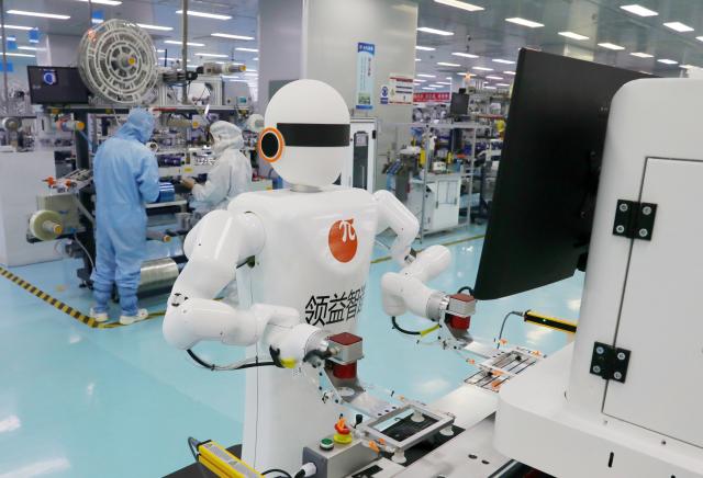 (260726) -- YANCHENG, July 26, 2026 (Xinhua) -- A robot works at a factory of LS City Technology (Jiangsu) Co., Ltd. in Yancheng City, east China's Jiangsu Province, July 25, 2026. LS City Technology (Jiangsu) Co., Ltd. has developed intelligent manufacturing equipment, with devices in the workshop embedded with the company's self-designed core algorithms.
  In recent years, Yancheng has focused on intelligent manufacturing and industrial upgrading in its industrial enterprises. By promoting technological innovation and optimizing the industrial chain, the city has forged a new path of high-quality development. (Xinhua/Mao Jun)