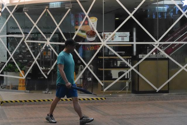 (260726) -- HONG KONG, July 26, 2026 (Xinhua) -- Window glasses are fortified with adhesive tapes as a precaution against typhoon in Hong Kong, south China, July 26, 2026. The Hong Kong Observatory downgraded the typhoon signal to the Strong Wind Signal No. 3 at 12:40 p.m. local time on Sunday as Typhoon Noul moves away.
   With Noul moving into inland Guangdong and weakening, local winds are decreasing gradually, according to the observatory. (Xinhua/Zhu Wei)