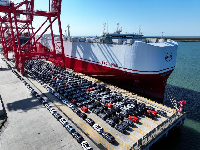 (260726) -- GUANGZHOU, July 26, 2026 (Xinhua) -- An aerial drone photo taken on May 29, 2026 shows new energy vehicles waiting for shipment at Nantong Port in Nantong, east China's Jiangsu Province. (Xinhua/Ji Chunpeng)