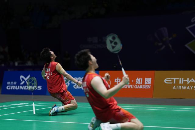 (260726) -- CHANGZHOU, July 26, 2026 (Xinhua) -- Liu Shengshu/Tan Ning (L) celebrate after winning the women's doubles final match between Liu Shengshu/Tan Ning of China and Fukushima Yuki/Matsumoto Mayu of Japan at the 2026 China Open badminton tournament in Changzhou, east China's Jiangsu Province, July 26, 2026. (Xinhua/Sun Fei)