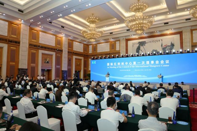 (260726) -- SHENZHEN, July 26, 2026 (Xinhua) -- This photo taken on July 26, 2026 shows the opening ceremony of the first council meeting of the International Mangrove Center in Shenzhen, south China's Guangdong Province.
  The first council meeting and inauguration ceremony of the International Mangrove Center was held here on Sunday. Representatives from member states, signatory countries and observer institutions of the center attended the meeting, during which a series of institutional documents including the strategic plan and rules of procedure have been reviewed and adopted, and the Secretary-General of the International Mangrove Center was appointed. The Secretariat of the center is officially settled in Shenzhen. (Xinhua/Liang Xu)