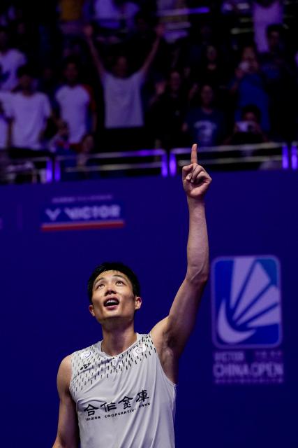 (260726) -- CHANGZHOU, July 26, 2026 (Xinhua) -- Chou Tien Chen celebrates after winning the men's singles final match between Chou Tien Chen of Chinese Taipei and Toma Junior Popov of France at the China Open 2026 badminton tournament in Changzhou, east China's Jiangsu Province, July 26, 2026. (Xinhua/Li Bo)