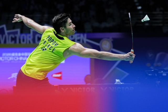 (260726) -- CHANGZHOU, July 26, 2026 (Xinhua) -- Toma Junior Popov competes during the men's singles final match between Chou Tien Chen of Chinese Taipei and Toma Junior Popov of France at the China Open 2026 badminton tournament in Changzhou, east China's Jiangsu Province, July 26, 2026. (Xinhua/Li Bo)