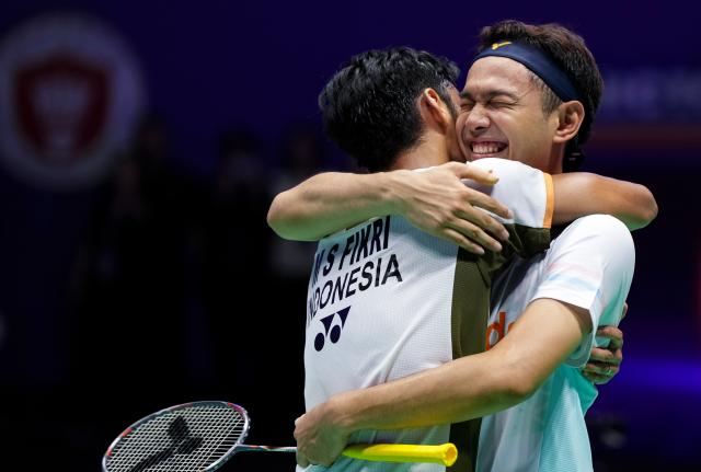 (260726) -- CHANGZHOU, July 26, 2026 (Xinhua) -- Fajar Alfian (R)/Muhammad Shohibul Fikri celebrate victory after winning the men's doubles final match between Fajar Alfian/Muhammad Shohibul Fikri of Indonesia and Kim Won Ho/Seo Seung Jae of South Korea at the China Open 2026 badminton tournament in Changzhou, east China's Jiangsu Province, July 26, 2026. (Xinhua/Sun Fei)